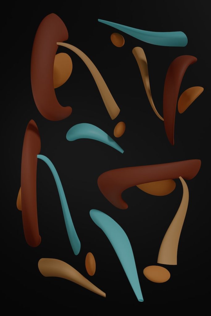 a group of abstract shapes on a black background